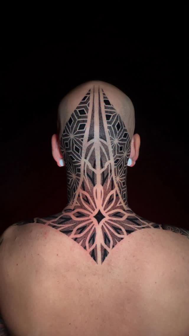 Instagram post by @alex_santucci_tattooer for World Famous Tattoo Ink. Caption reads: Dotwork Neck/Head done with @worldfamousink....