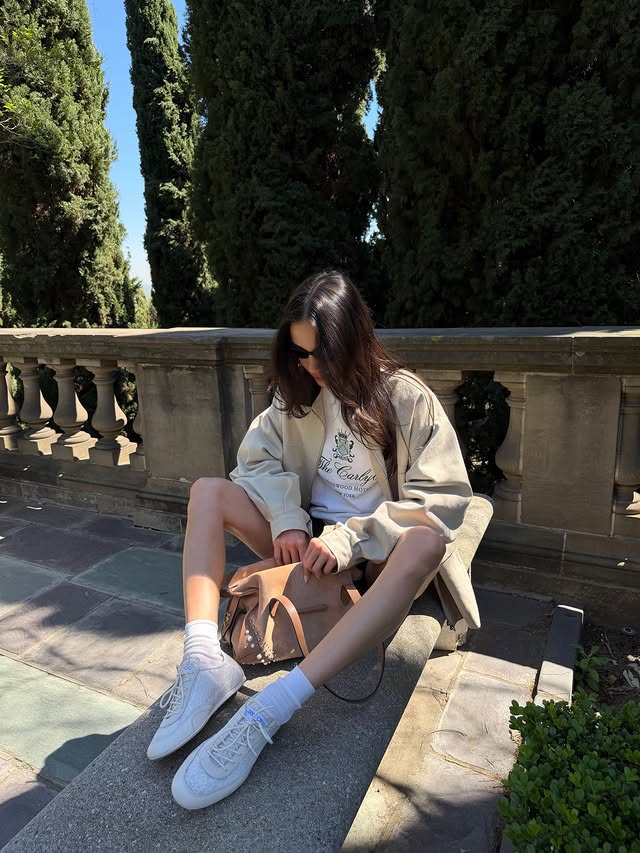 Instagram post by @kelseymerritt for Jimmy Choo. Caption reads: afternoon pick me up @jimmychoo #jimmychoo ad.