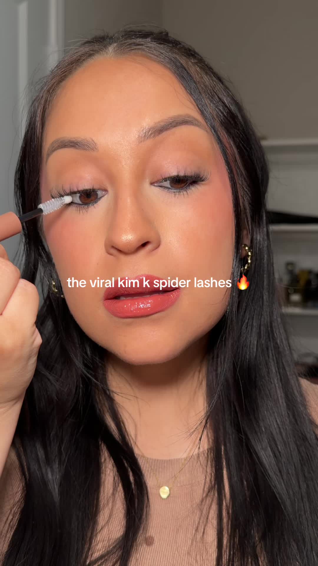 TikTok post by @leslievillan.style for MaxComfi Lashes. Caption reads: [...] with these lashes is unreal @MaxComfi Lashes....