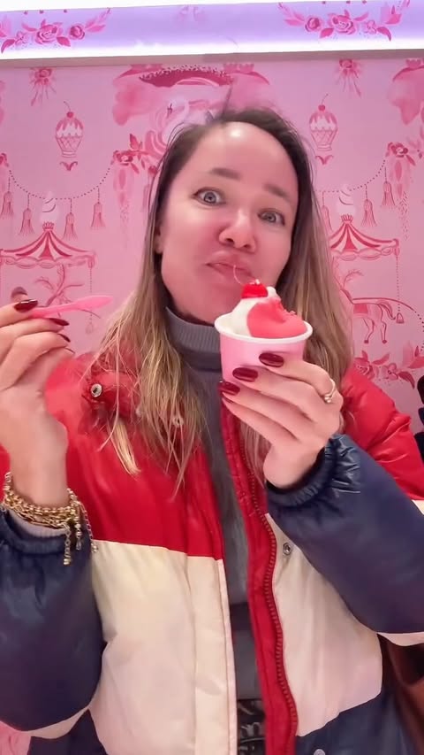 Instagram post by @alinaantman_nyc for GetYourGuide. Caption reads: ✨ When New York turns pink and happiness tastes....