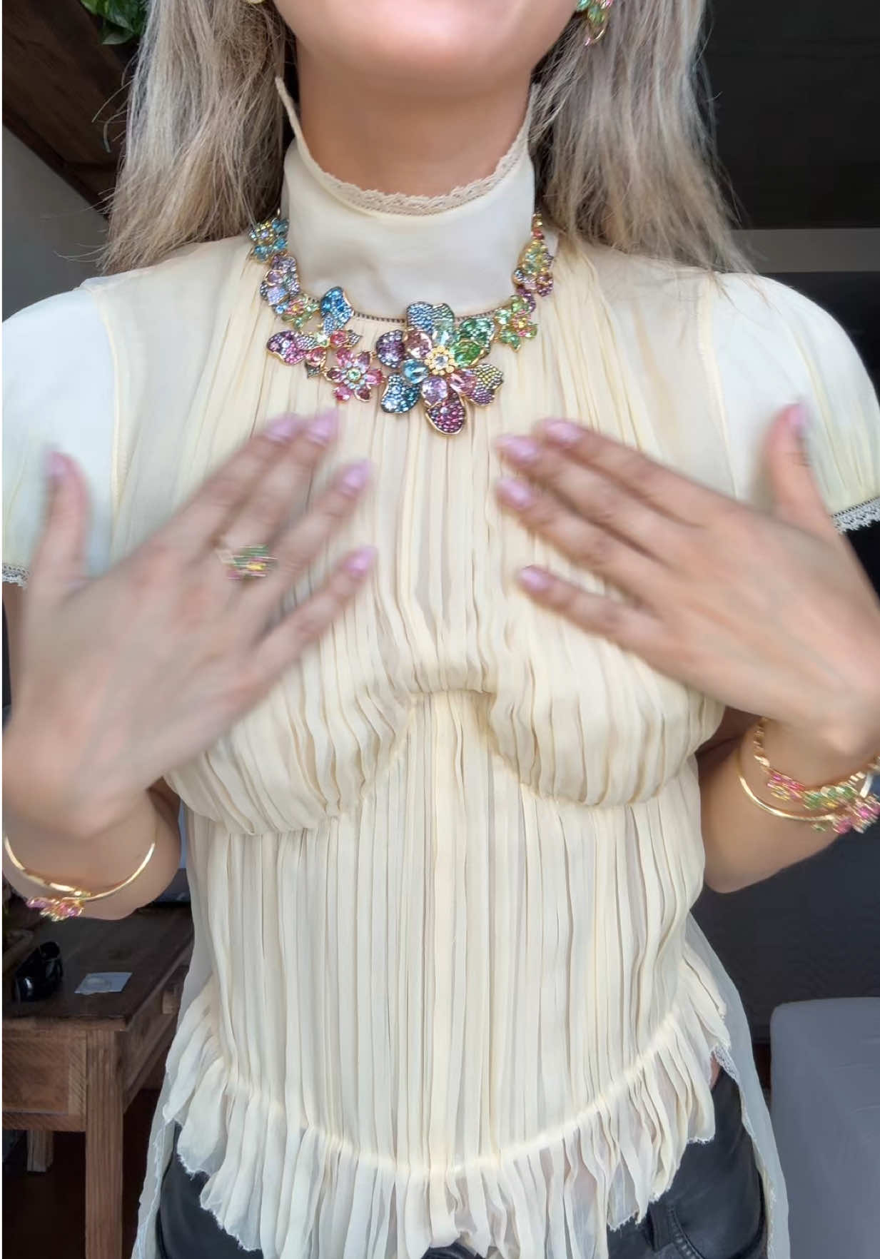 TikTok post by @izzipoopi for SWAROVSKI. Caption reads: I want to wear a 1000 @Swarovski crystals everyday....