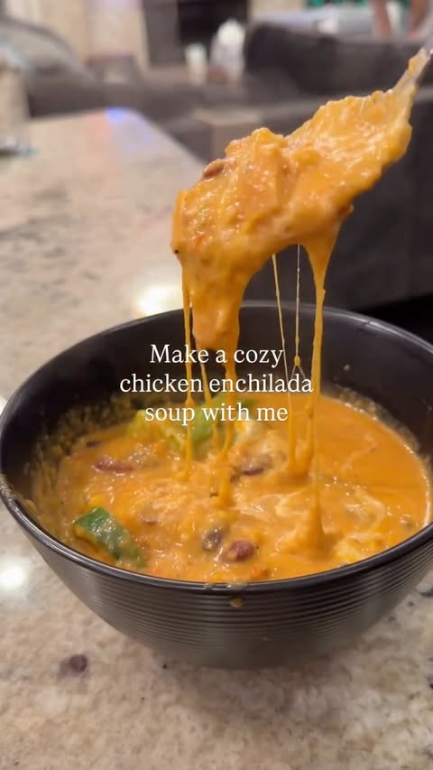 Instagram post by @diaryofafitmommyofficial for Kettle & Fire. Caption reads: You are going to love this cozy chicken enchilada....