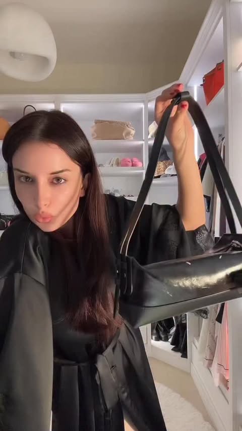 Instagram post by @juliahussein___ for Maison Margiela. Caption reads: Styling my @maisonmargiela 🖤.