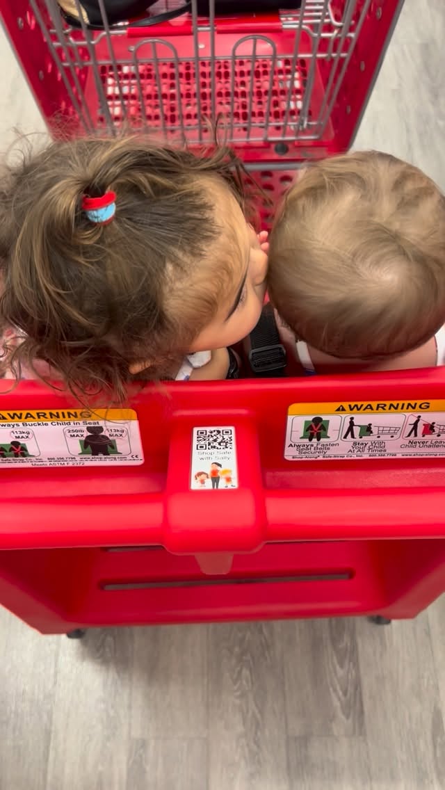 Instagram post by @itsaprilmarie for Enfamil. Caption reads: #ad Went to @target to stock up on our toddler’s....