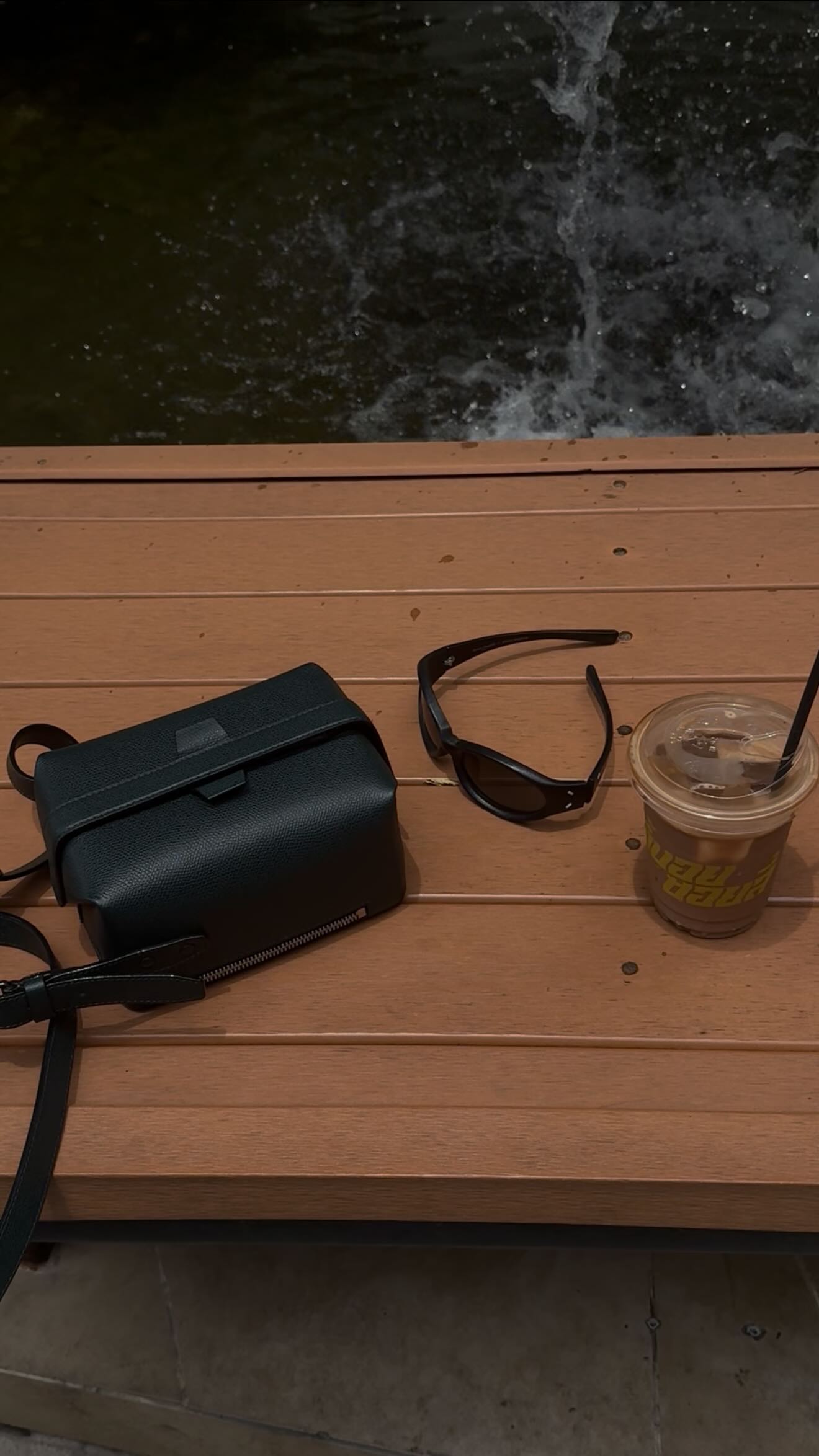 Instagram post by @oumaymaboumeshouli for Valextra. Caption reads: Easy to travel with, chic enough for city strolls.....