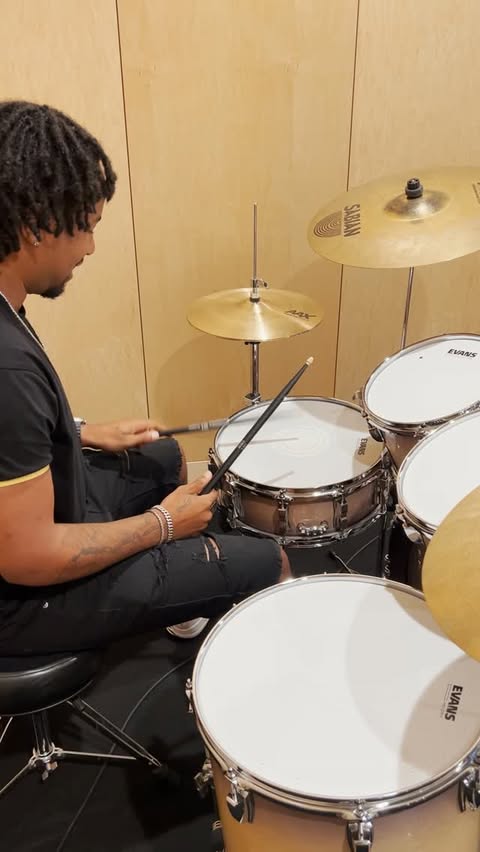 Instagram post by @dreh2341 for EVANS Drumheads. Caption reads: Dre Hemby (@dreh2341) of @TeddySwims and....