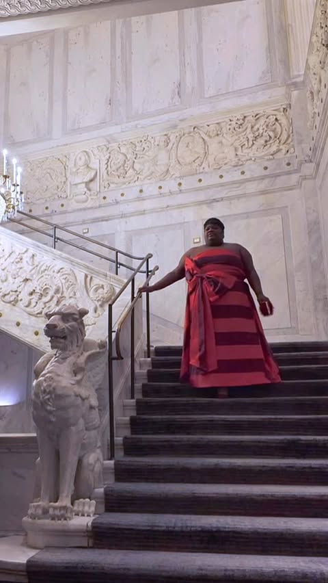 Instagram post by @keziakswift for ELOQUII. Caption reads: All eyes on me ✨ @ELOQUII Dramatic Bow Dress....