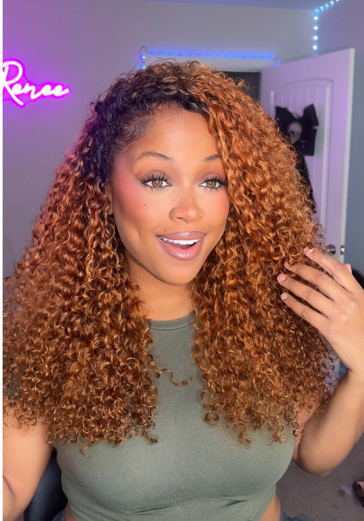 TikTok post by @arenee.mua for Curlyme. Caption reads: [...] WIGS ARE HEREEEE! 🍂🍁🥹🤏🏽 @CurlyMe Hair....