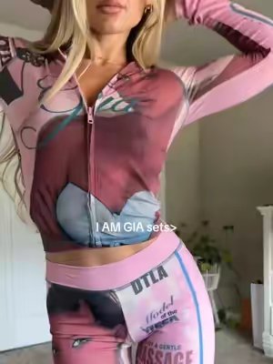 TikTok post by @machaelala for IAMGIA. Caption reads: Get the settttt @I.AM.GIA #iamgia #sets #sweatsuit.