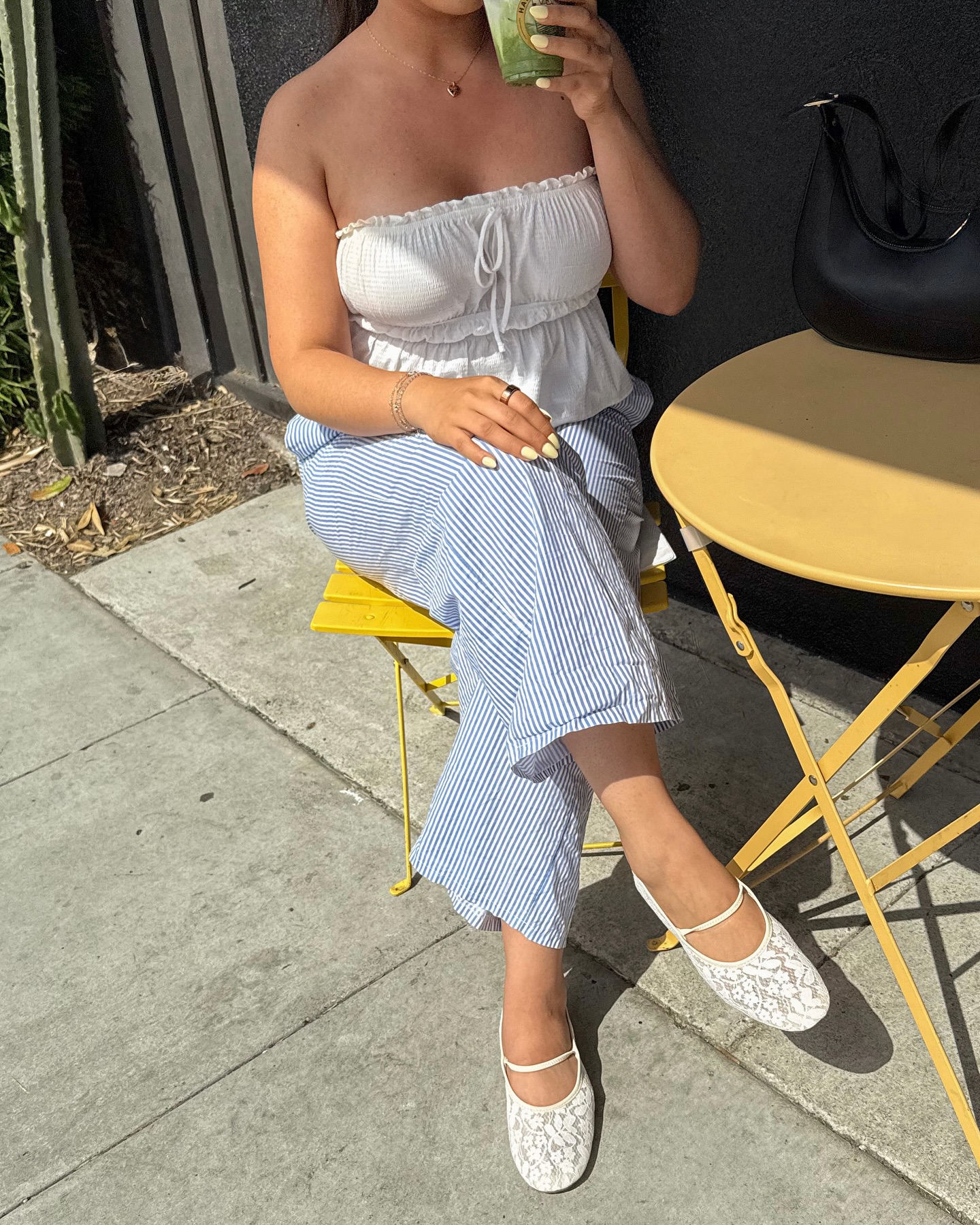 Instagram post by @kimberlygonzlz for JustFab. Caption reads: slow mornings & soft details 🍵🌸🕊️....