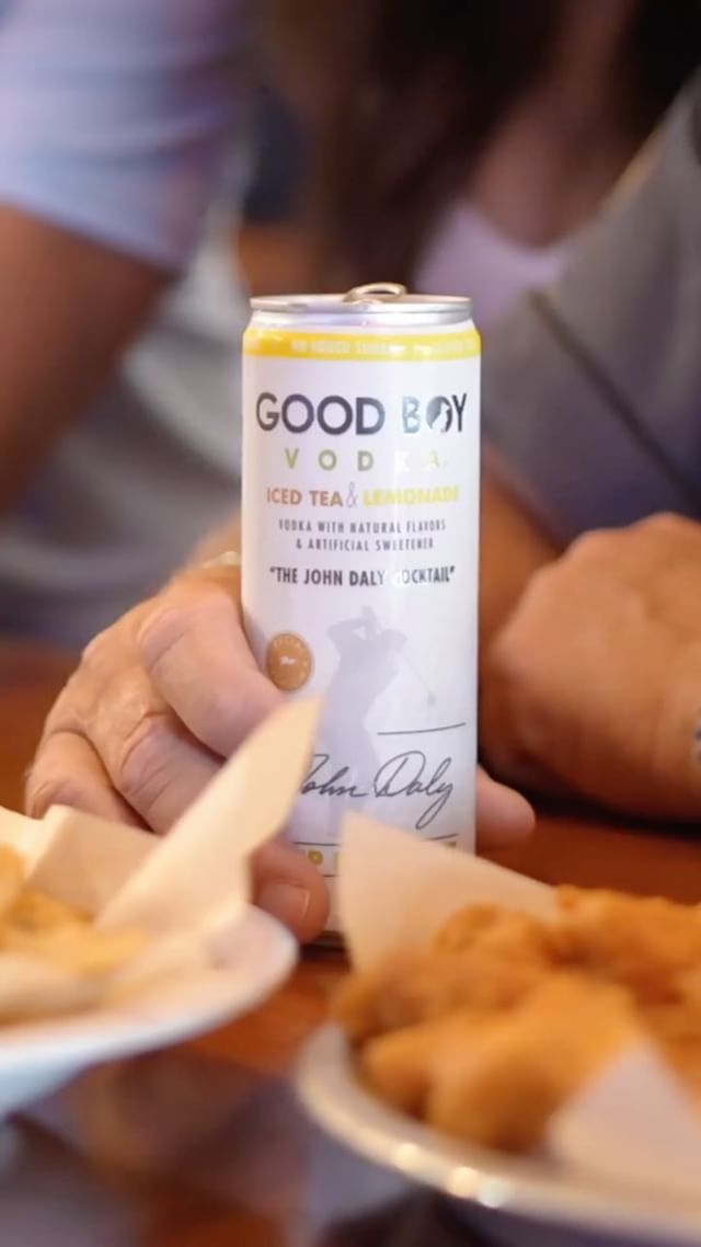 Instagram post by @pga_johndaly for Hooters. Caption reads: Grip it, rip it, and get yourself a Good Boy....