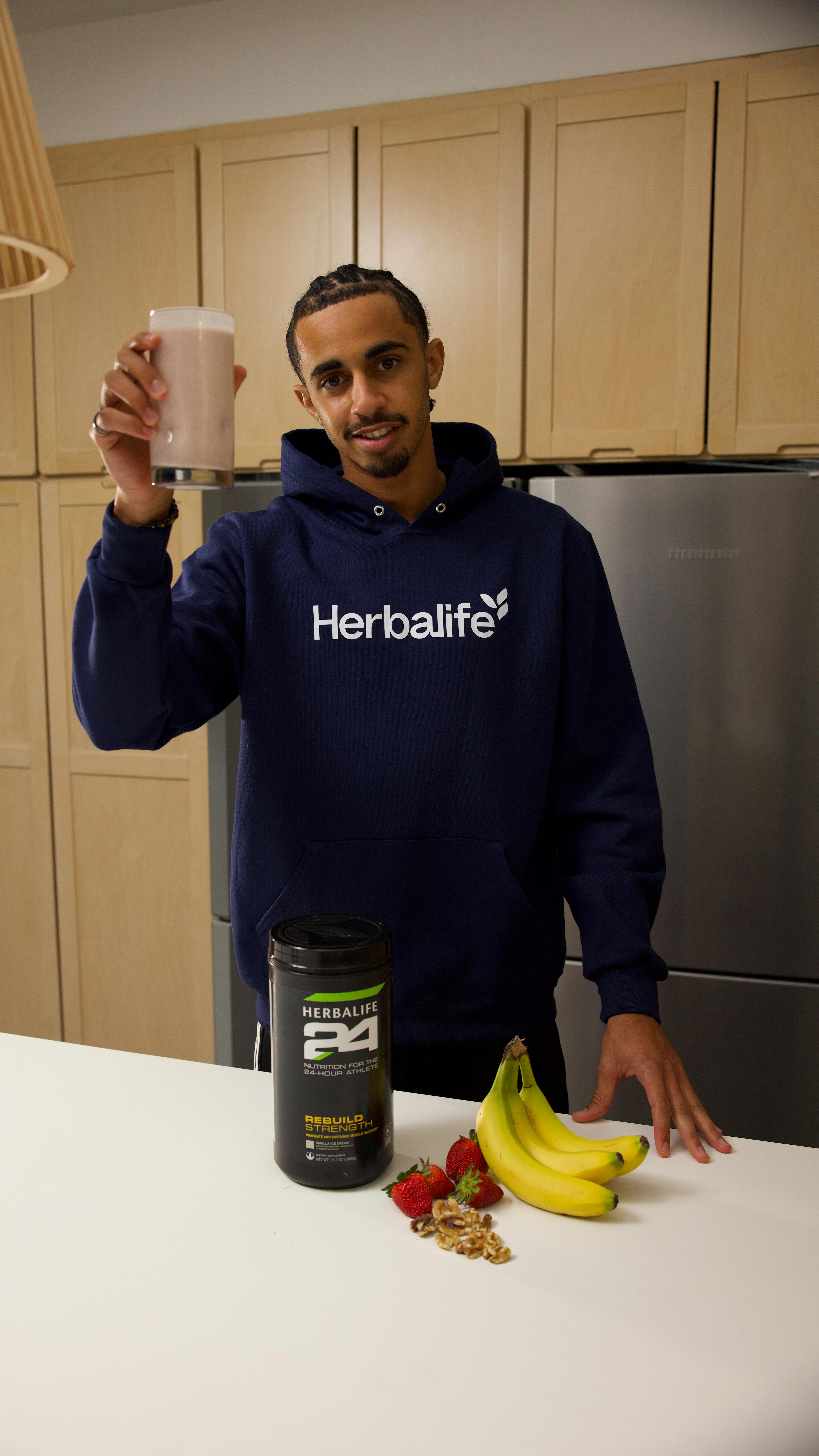 Instagram post by @jalenneal_ for Herbalife. Caption reads: Tastes like dessert. Fuels like recovery.....