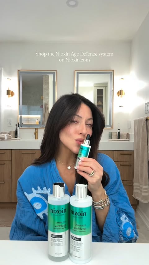 Instagram post by @melissa.viggiani for NIOXIN. Caption reads: @nioxin Age Defence System had me at delayed [...].