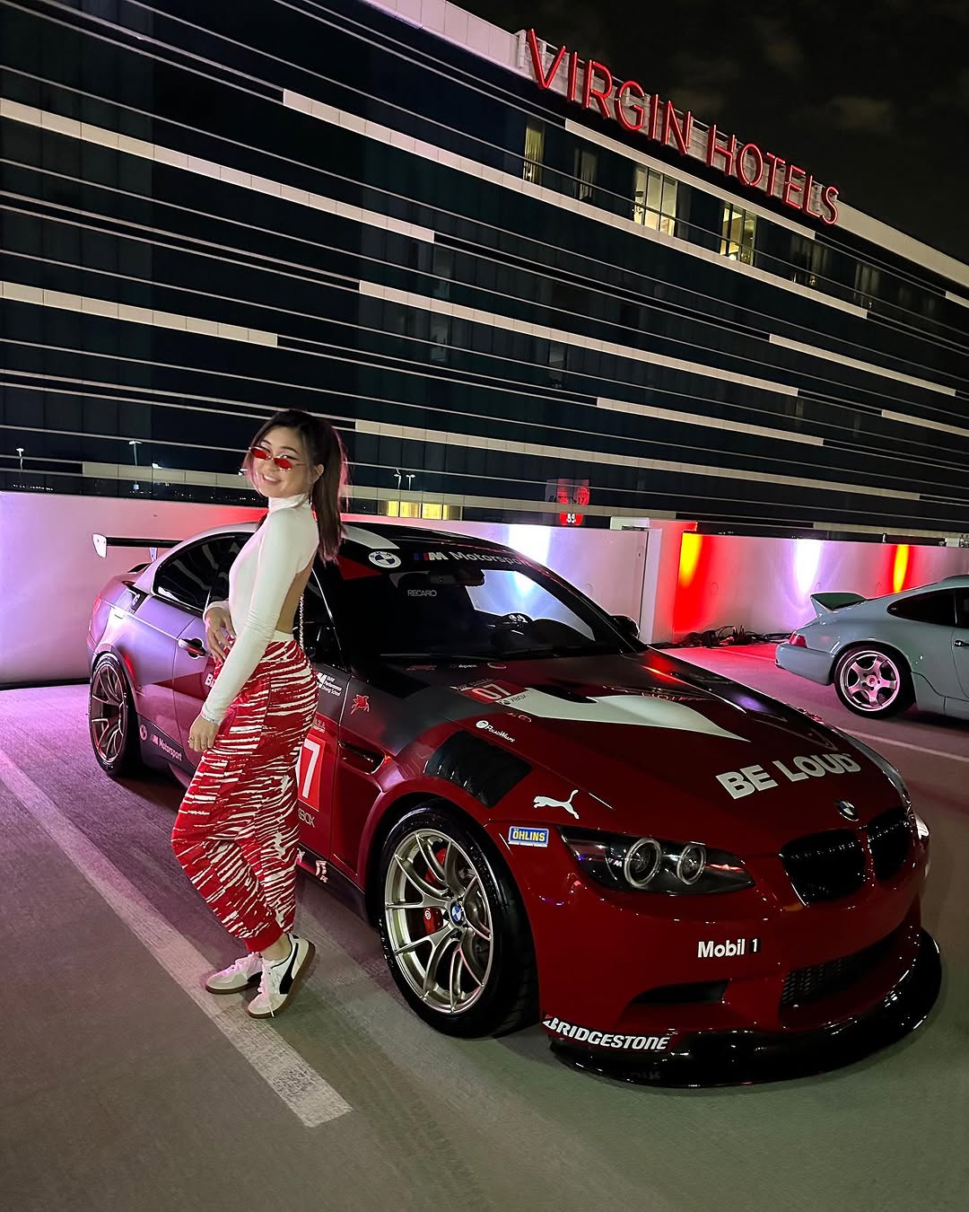Instagram post by @samanthaatan for Champs Sports. Caption reads: night vibes at the @pumamotorsport car club....