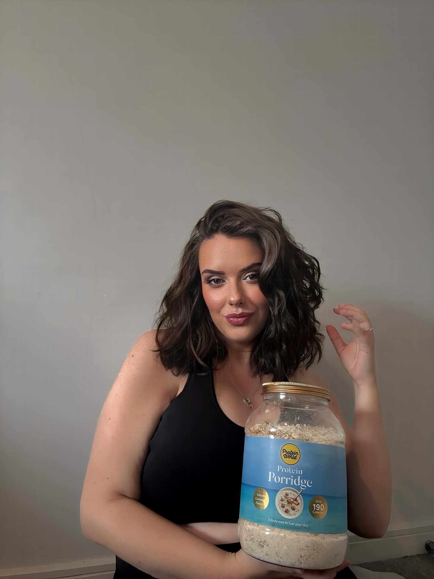 Instagram post by @abs_sophiaaa for Protein World. Caption reads: Thankyou @proteinworld For topping up my favourite....
