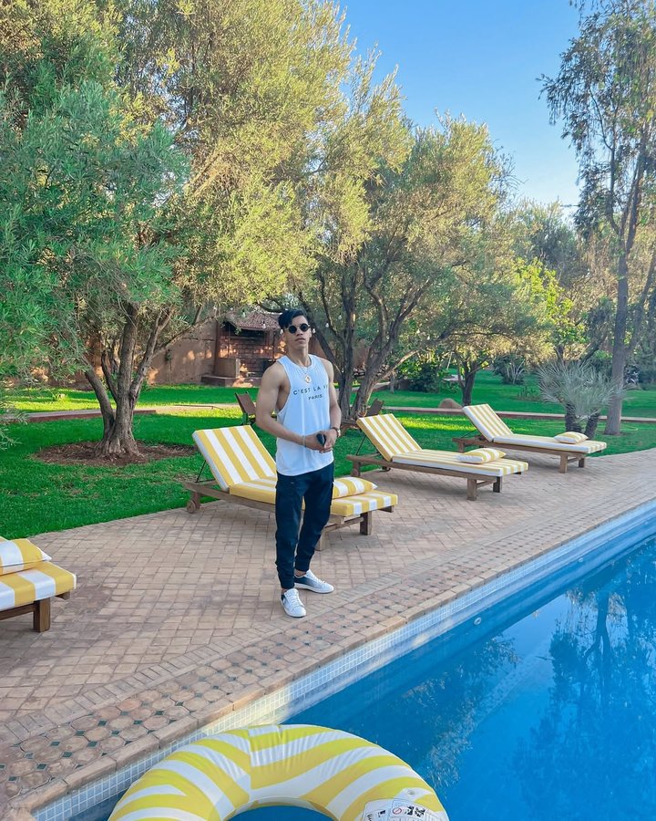 Instagram post by @otman_akes for Men's Fashion & Style. Caption reads: Luck and work are partners. The more you work, the....