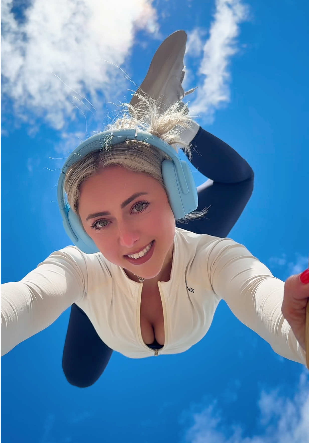 TikTok post by @chelsea.evee for Skullcandy. Caption reads: [...] FLASHING LIGHTS‼️ 👁️👄👁️ @skullcandy....