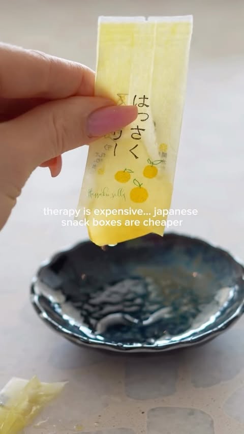 Instagram post by @hungrygeisha for Sakuraco. Caption reads: Snack box asmr with @wearesakuraco You can use my....