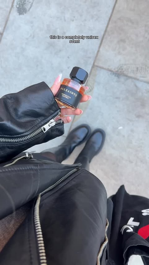 Instagram post by @mariajoynson for ALLSAINTS. Caption reads: [...] classic with a fragrance to match 🖤....