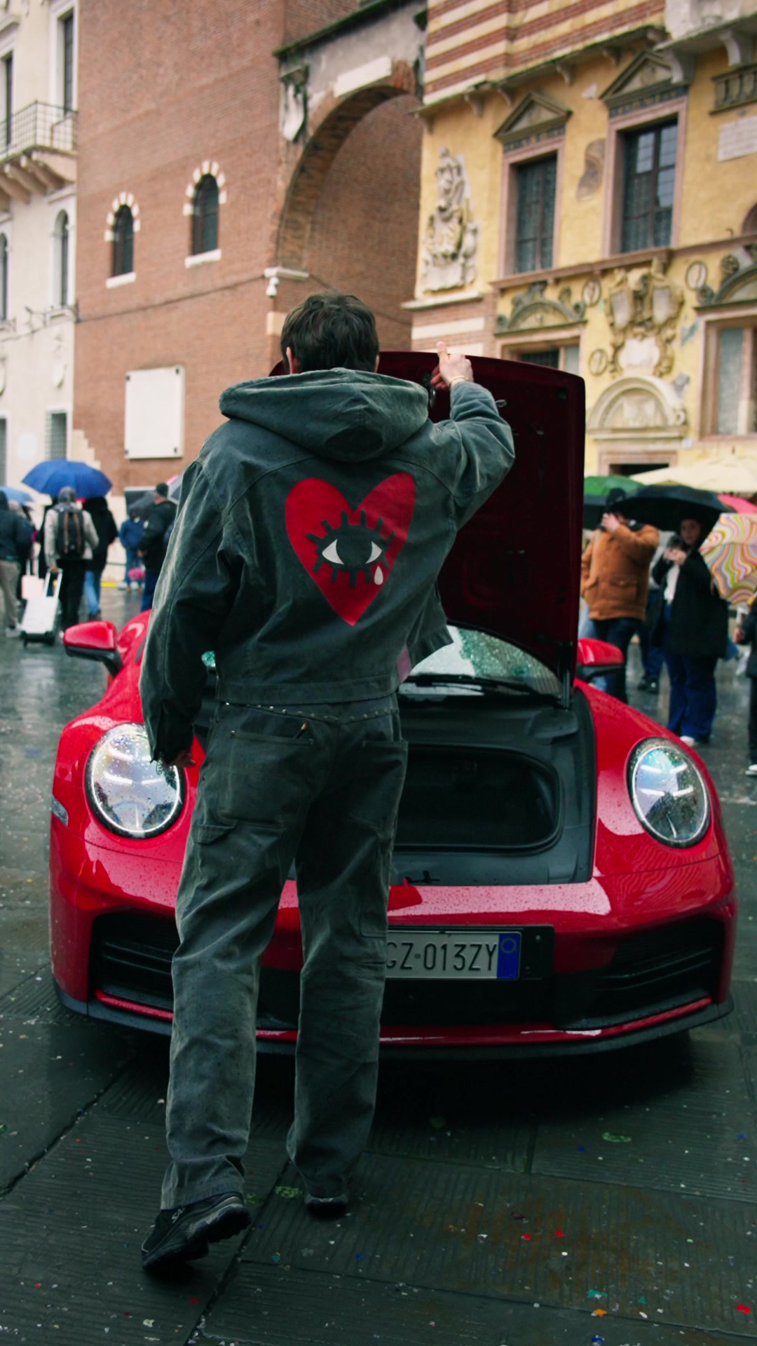 TikTok post by @greggoya for Porsche. Caption reads: Tell people you love them I turned a Porsche 911....