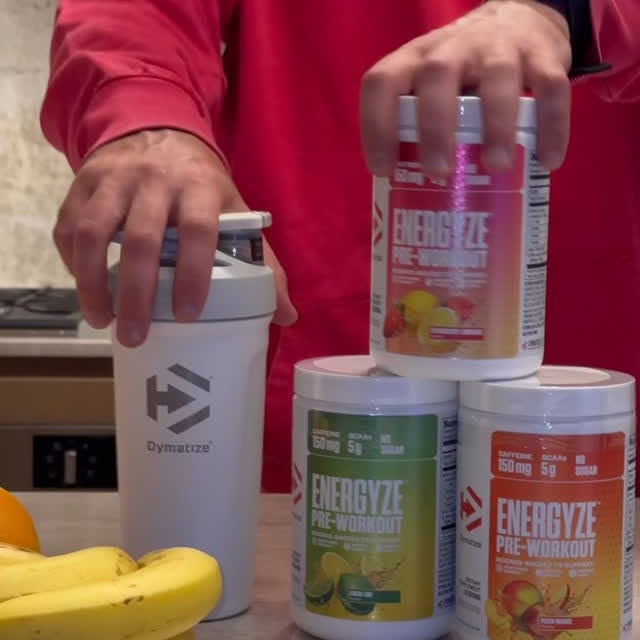 Instagram post by @soufs_videos for Dymatize. Caption reads: #Ad Ready to Elevate Your Fitness Game? Comment....
