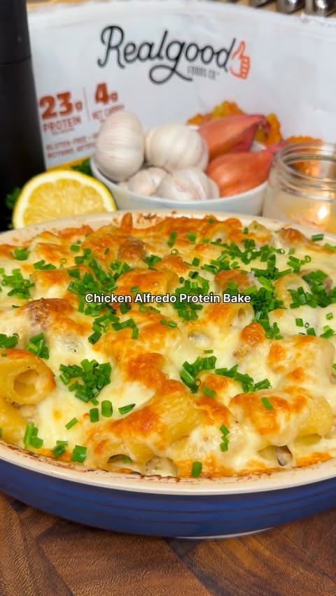 Instagram post by @munchiesbymitchell for Real Good Foods Co.. Caption reads: This Chicken Alfredo Protein Bake is only 5....
