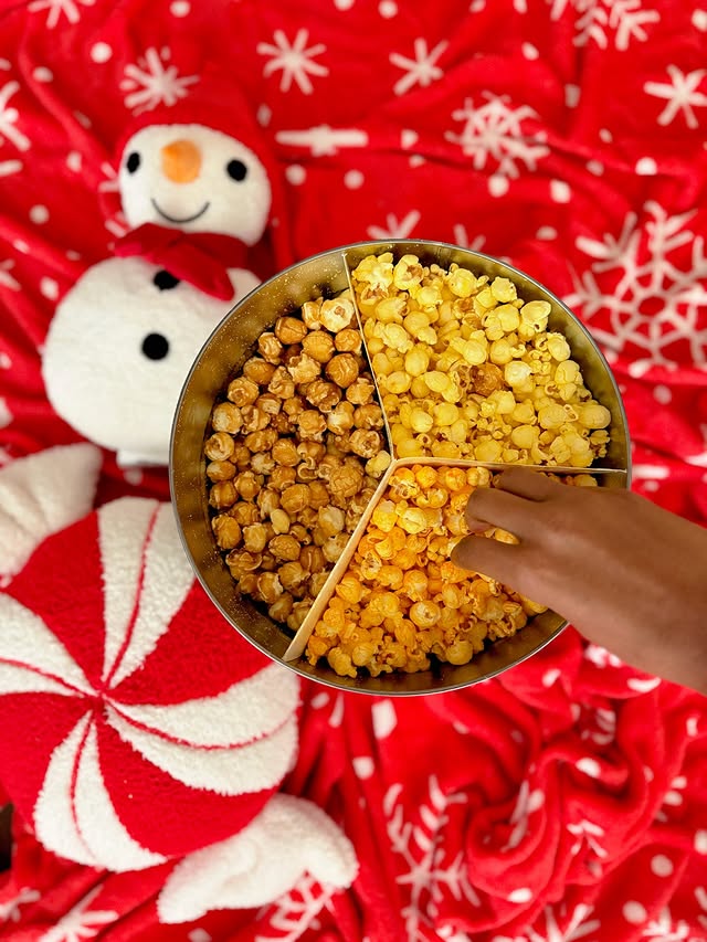 Instagram post by @ashleyimperfect for The Popcorn Factory. Caption reads: Stepping into my own Popcorn Wonderland with....