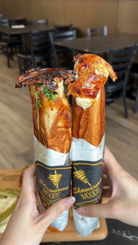 Instagram post by @shawarmamoods for Fun Things Toronto. Caption reads: ✨ VIRAL CRISPY SHAWARMA ✨ Did you know that....