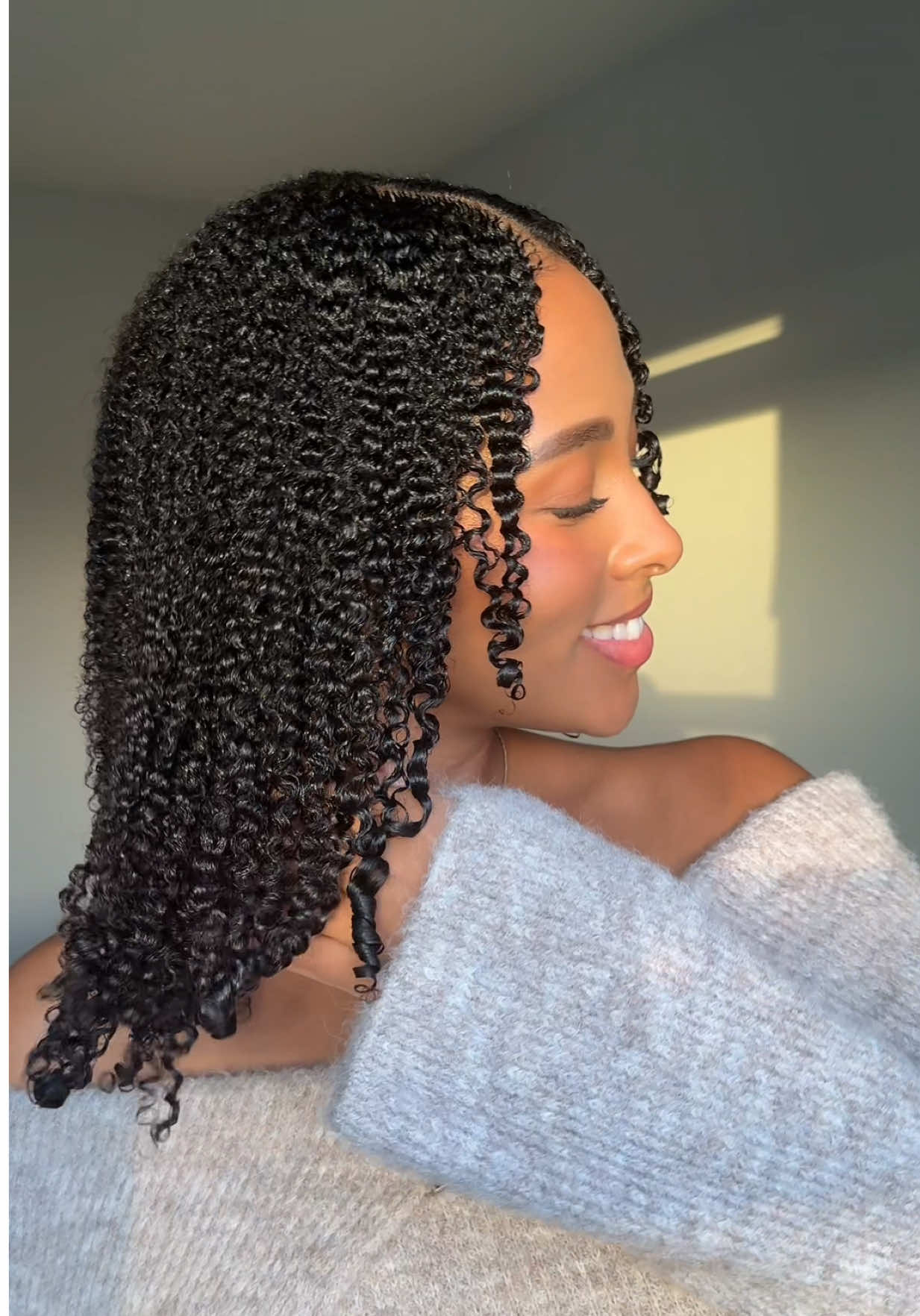 TikTok post by @kristina.manners for DevaCurl. Caption reads: [...] 7 curls have never looked this good!....