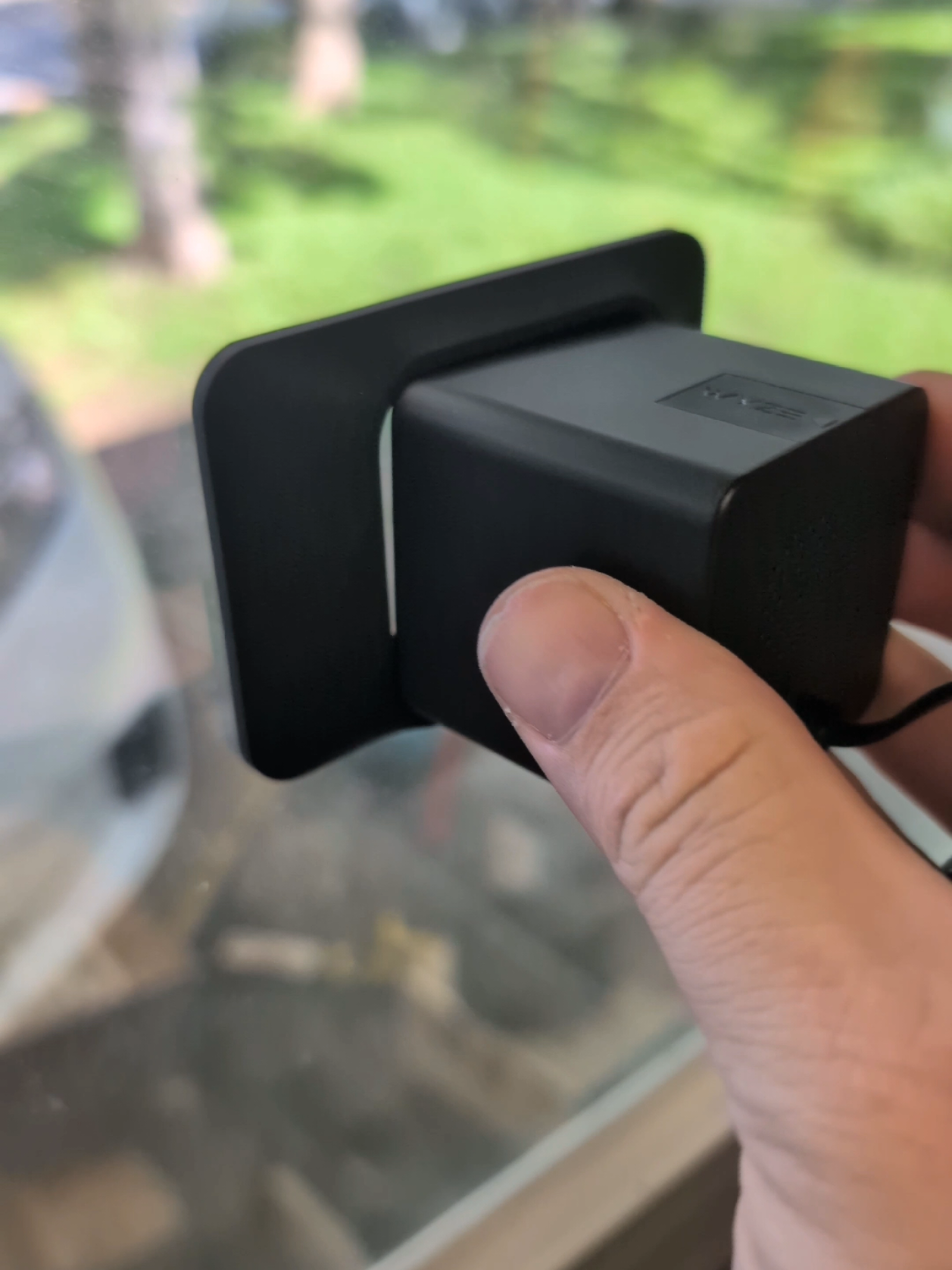 TikTok post by @jonny_steele for Wyze. Caption reads: Wyze Window Cam OG. An easy to install window....