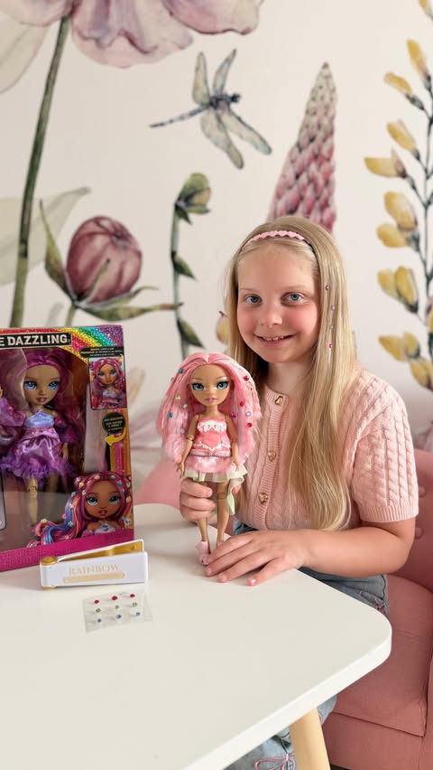Instagram post by @erin.grace.b for Rainbow High. Caption reads: [...] obsessed with her new @officialrainbowhigh....