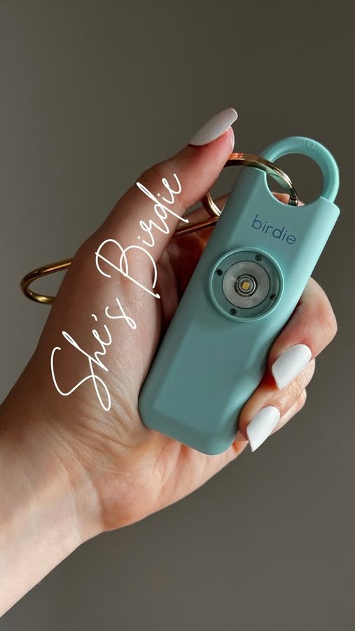 Instagram post by @allietims for She's Birdie. Caption reads: Always feeling safe on the go thanks to my....