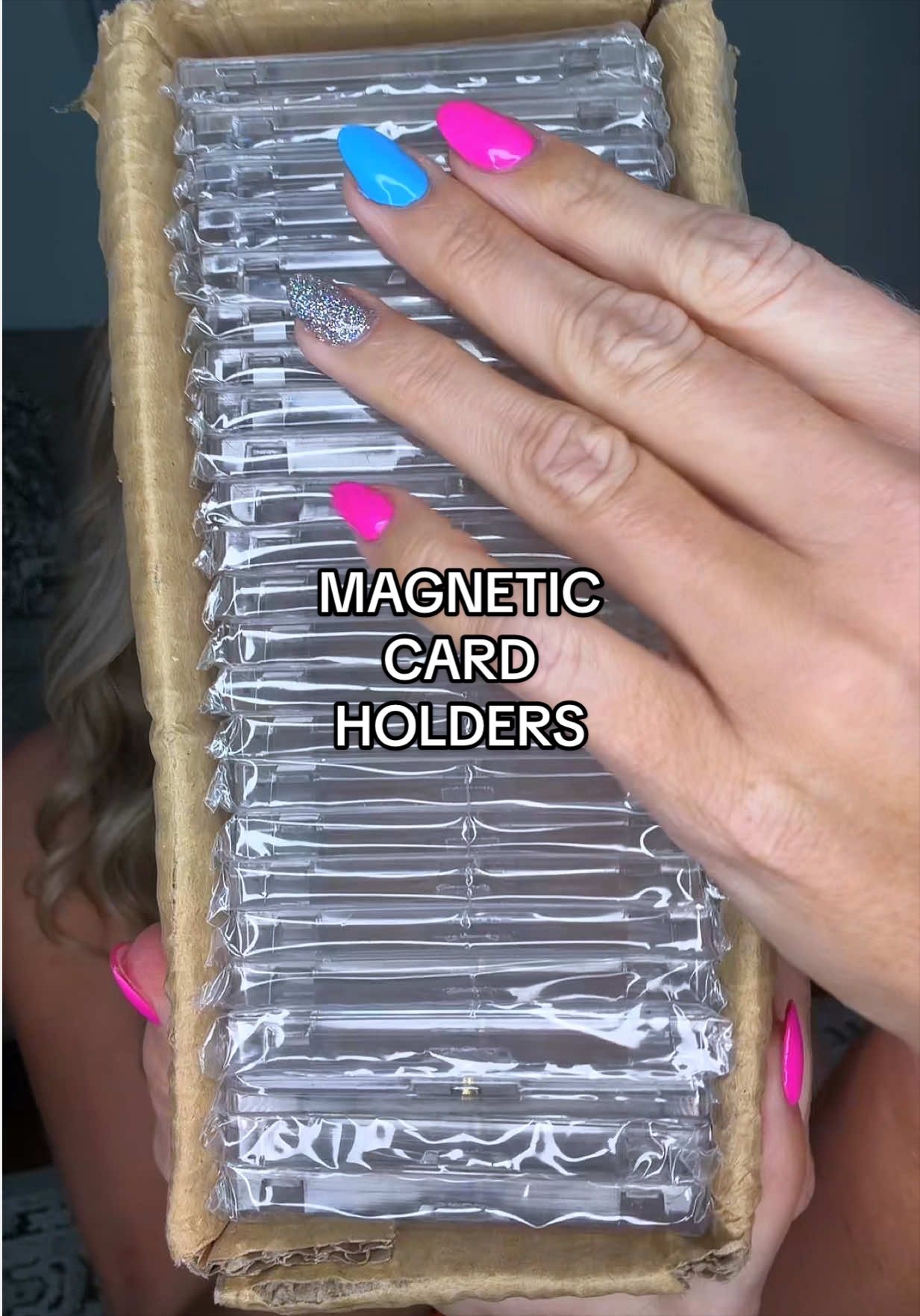 TikTok post by @mckaylalucas1 for UFORU NEST. Caption reads: [...] all these magnetic card holders 🏈 @UFORU....