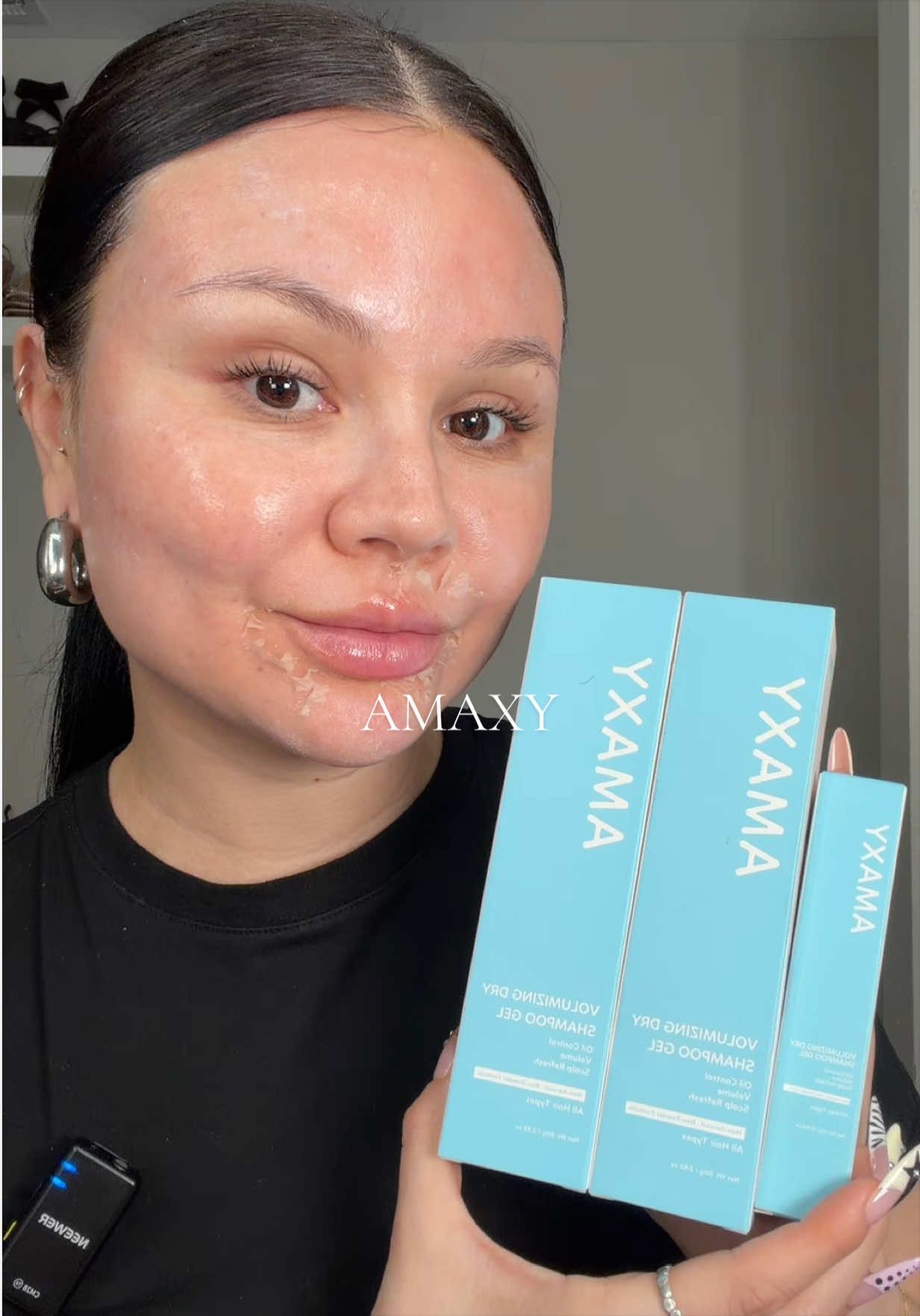 TikTok post by @keekittykimm for AMAXY Beauty. Caption reads: @AMAXY Haircares 💙 #dryshampoo #amaxy #tiktokshop....