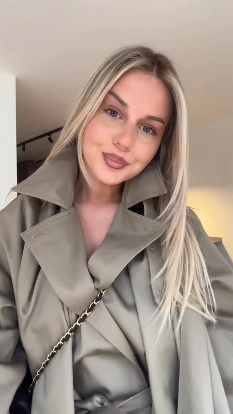 Instagram post by @teodoradovanovic for REVOLVE. Caption reads: [...] trench just joined my capsule wardrobe....