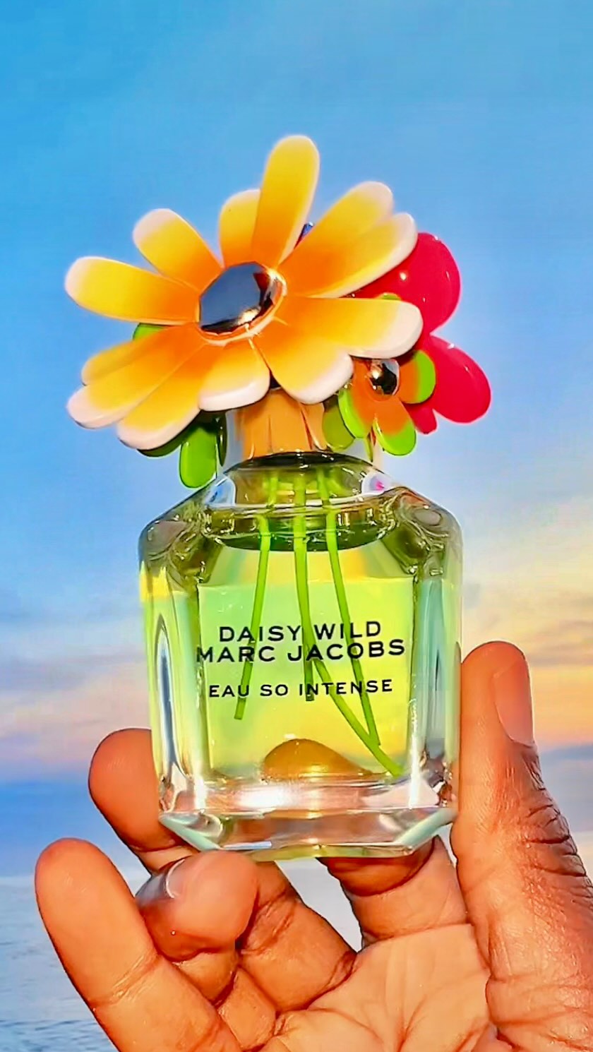 Instagram post by @ayah_scent_diary for The Perfume Shop. Caption reads: Daisy Wild Eau So Intense by @marcjacobsfragrances....