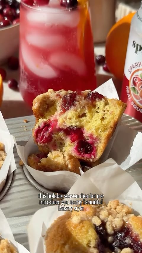 Instagram post by @ambitiouskitchen for Spindrift. Caption reads: [...] ORANGE MUFFINS inspired by @drinkspindrift’s....