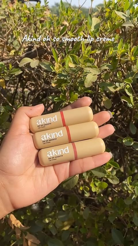 Instagram post by @bansal_rashii for AKIND. Caption reads: Because your lips deserve skincare too 💗 Akind Oh....