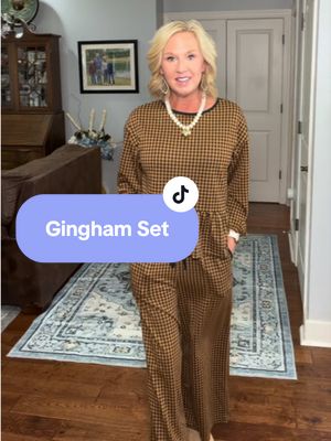 TikTok post by @ambermomms for OmmigO. Caption reads: The perfect set for fall! I’m loving the gingham....
