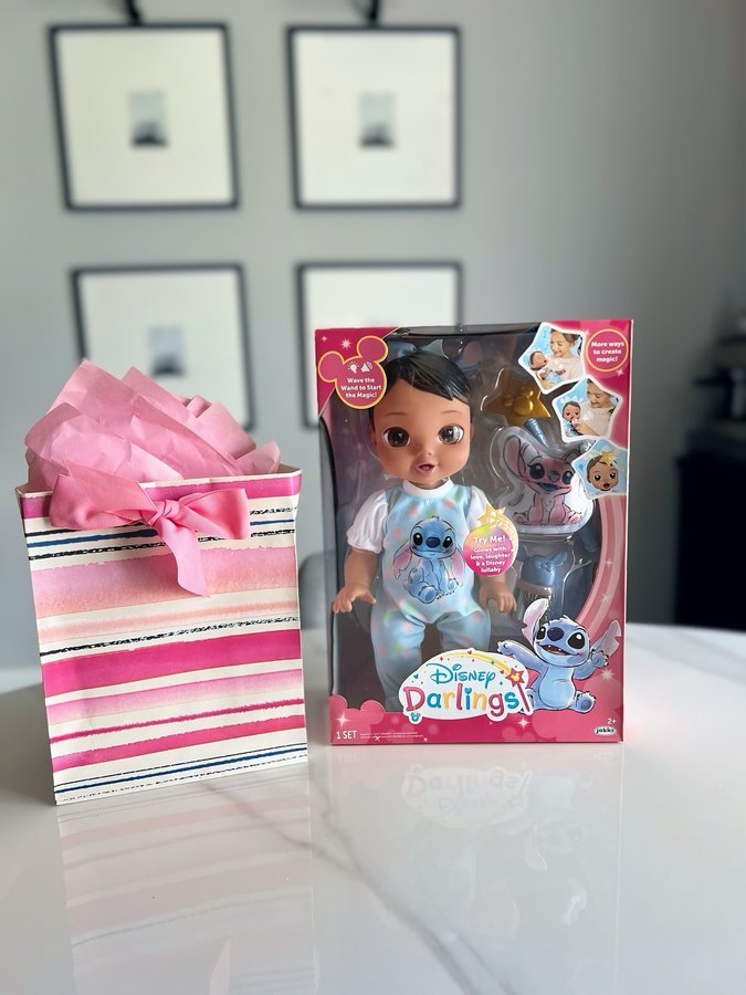 Instagram post by @ashleyimperfect for JAKKS Pacific. Caption reads: The Disney Darlings Stitch Deluxe Doll is....