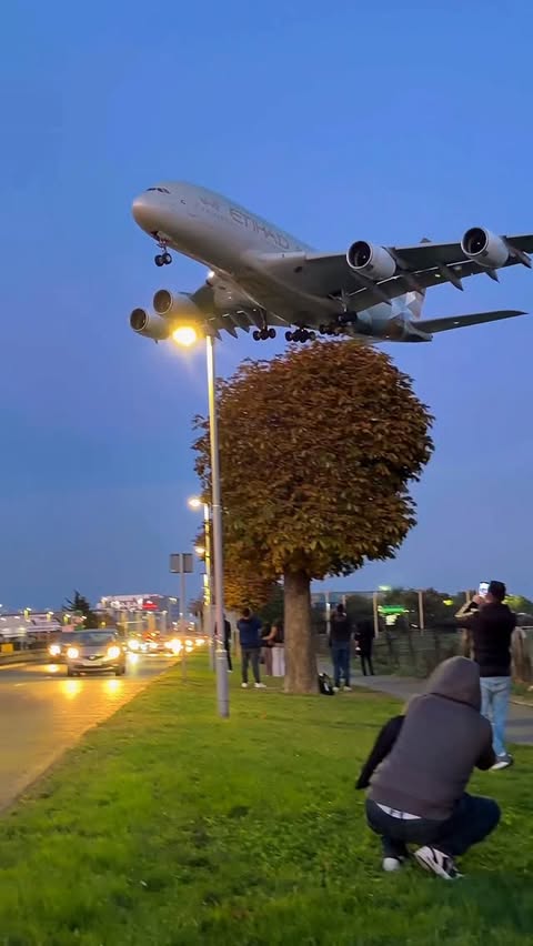 Instagram post by @elemer.aviation for Etihad Airways. Caption reads: Etihad Airways Airbus A380 Sunset landing at....