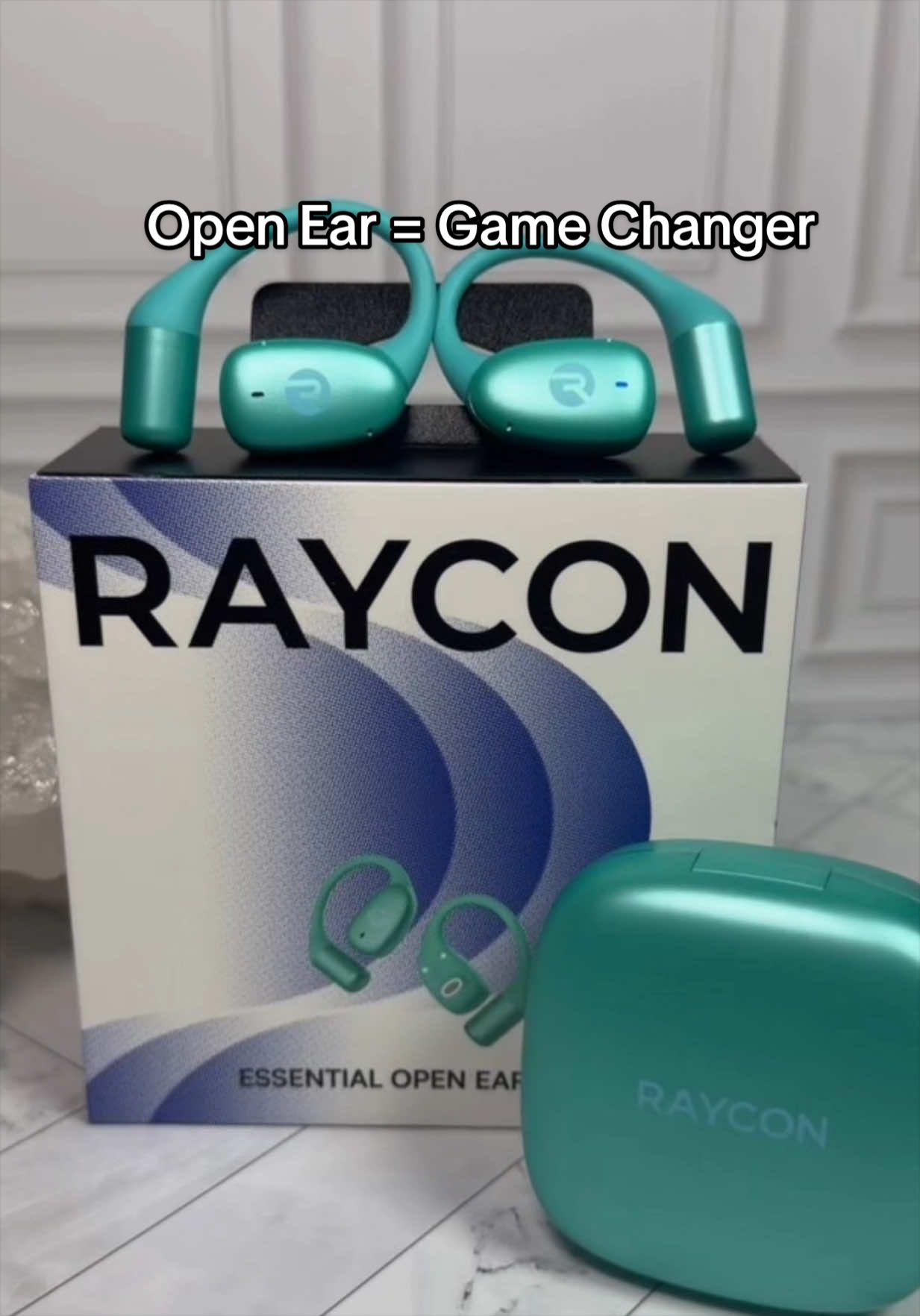TikTok post by @myshelle.gadgetglow for Raycon. Caption reads: [...] to check the current TikTok Shop price.....