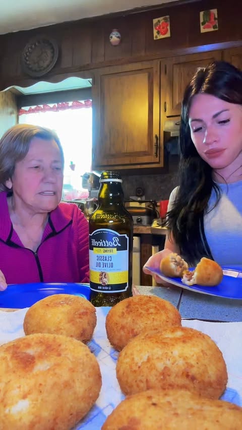 Instagram post by @laitalianprincess for Botticelli Foods. Caption reads: Frying up some arancini using our @botticellifoods....