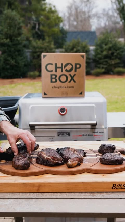 Instagram post by @iron_fire_cooking for Monument Grills. Caption reads: [...] 2 NY Strips LINK IN BIO @eatchopbox....