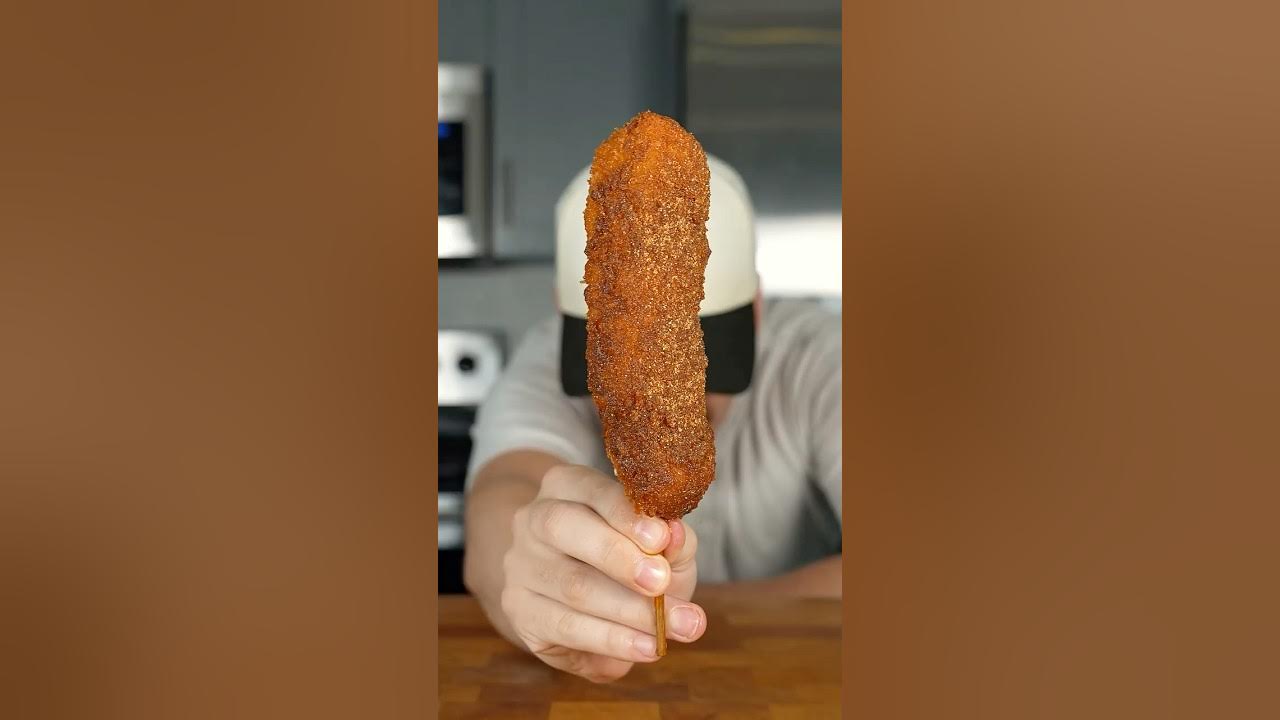 YouTube post by @blakemenard for Vita Coco. Caption reads: [...] Nashville Hot Korean Corn Dog @vitacoco....