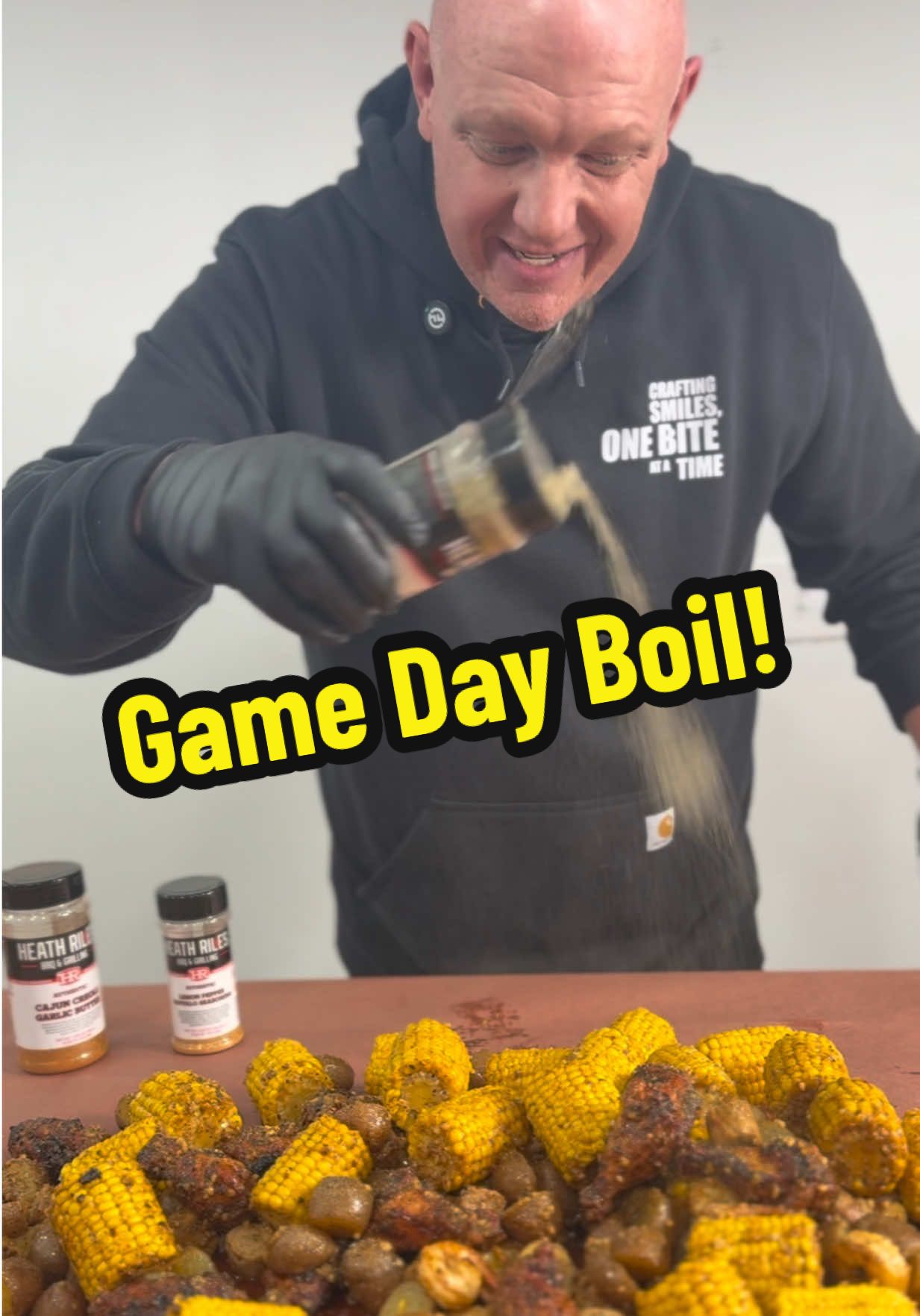 TikTok post by @smokingpastor for Heath Riles BBQ. Caption reads: [...] wings + sausage + corn + potatoes @Heath....