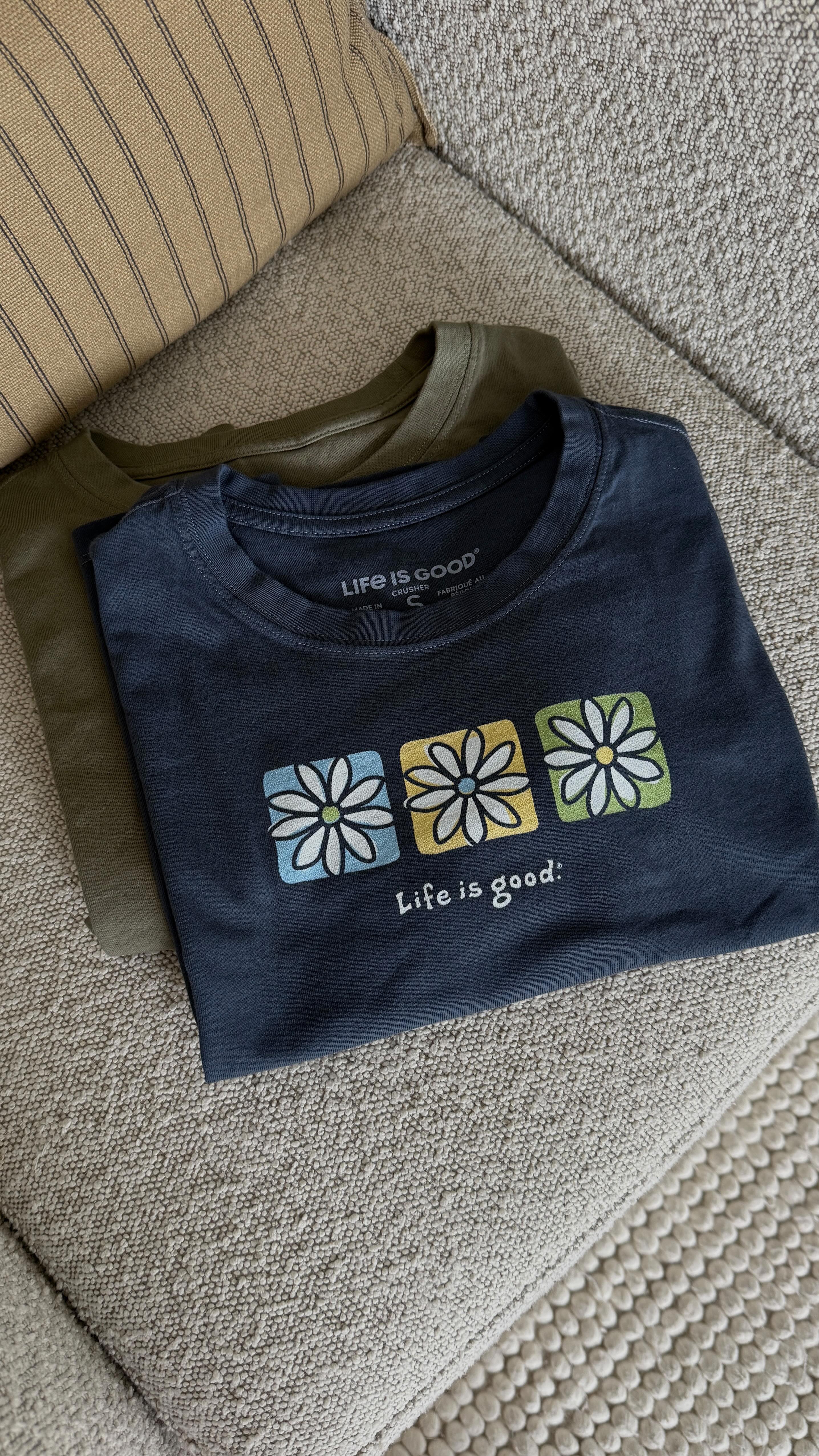 Instagram post by @madelinelikesclothes for Life Is Good. Caption reads: Feeling nostalgic in my @lifeisgoodco! Code....