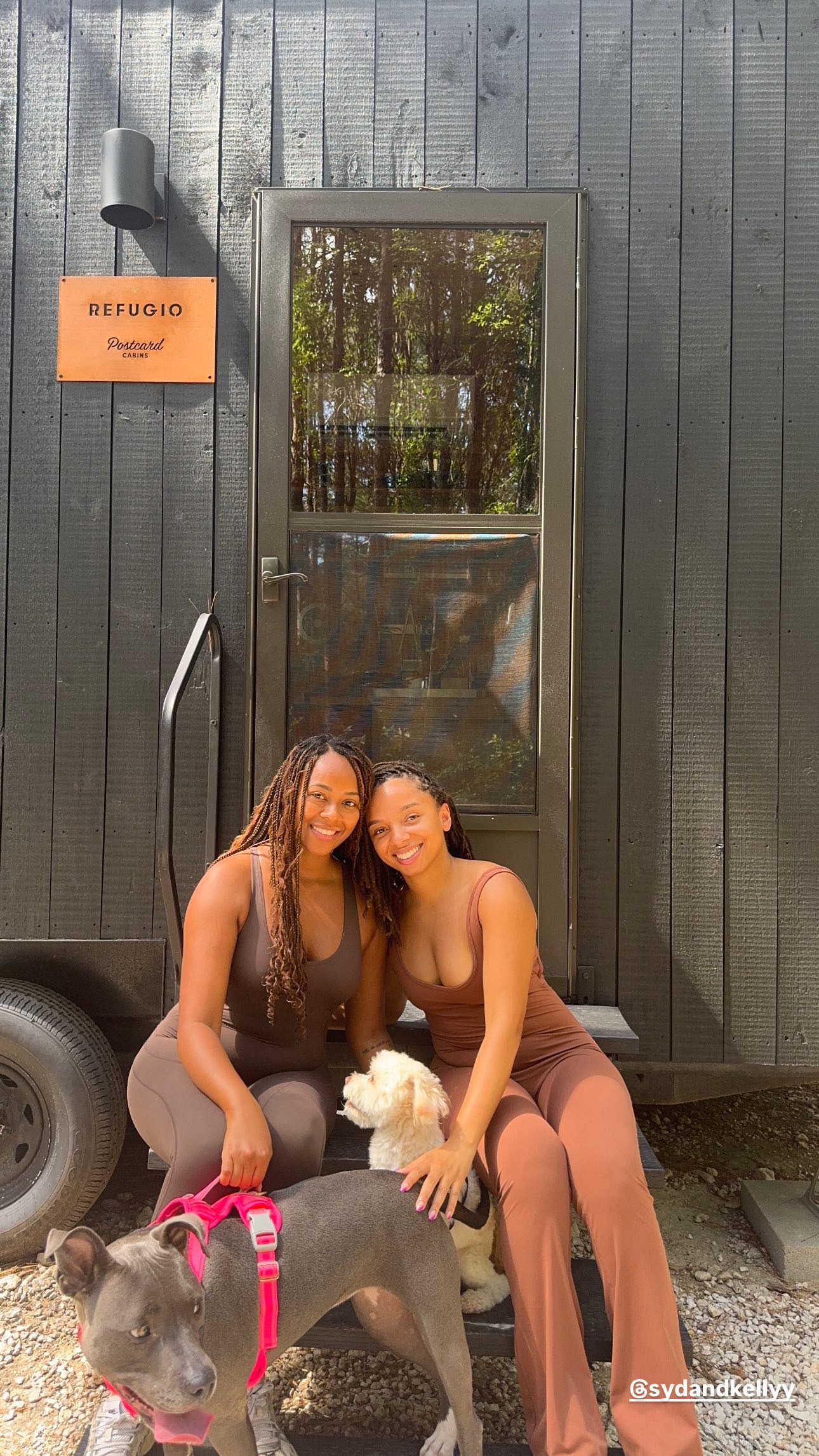 Instagram post by @sydandkellyy for Postcard Cabins. Caption reads: 🌲 CALLING ALL NATURE GIRLS 🌲 

 
@postcardcabins....