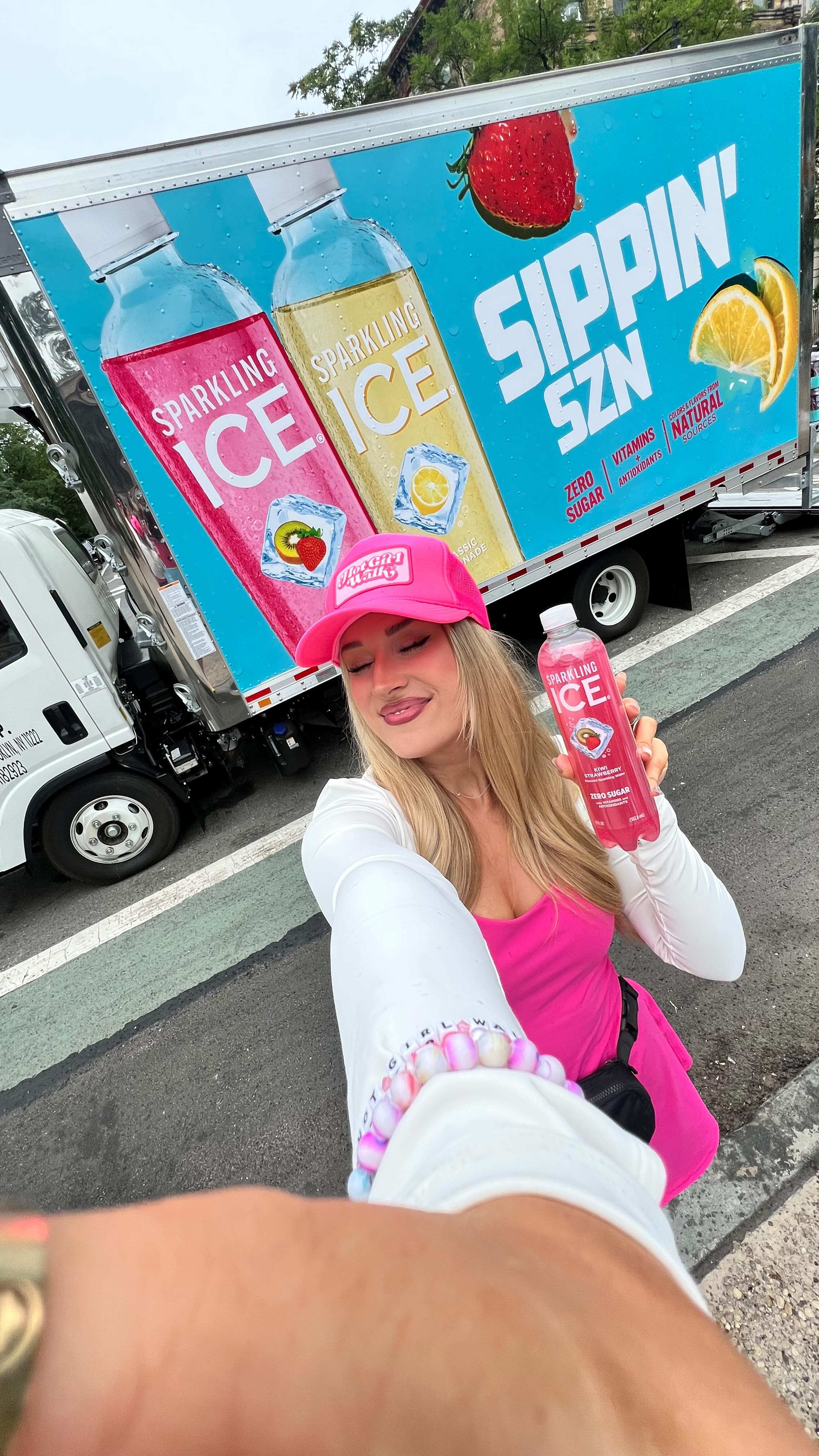 Instagram post by @hotgirlwalk for Sparkling Ice. Caption reads: Wherever your Hot Girl Walks take you this summer,....