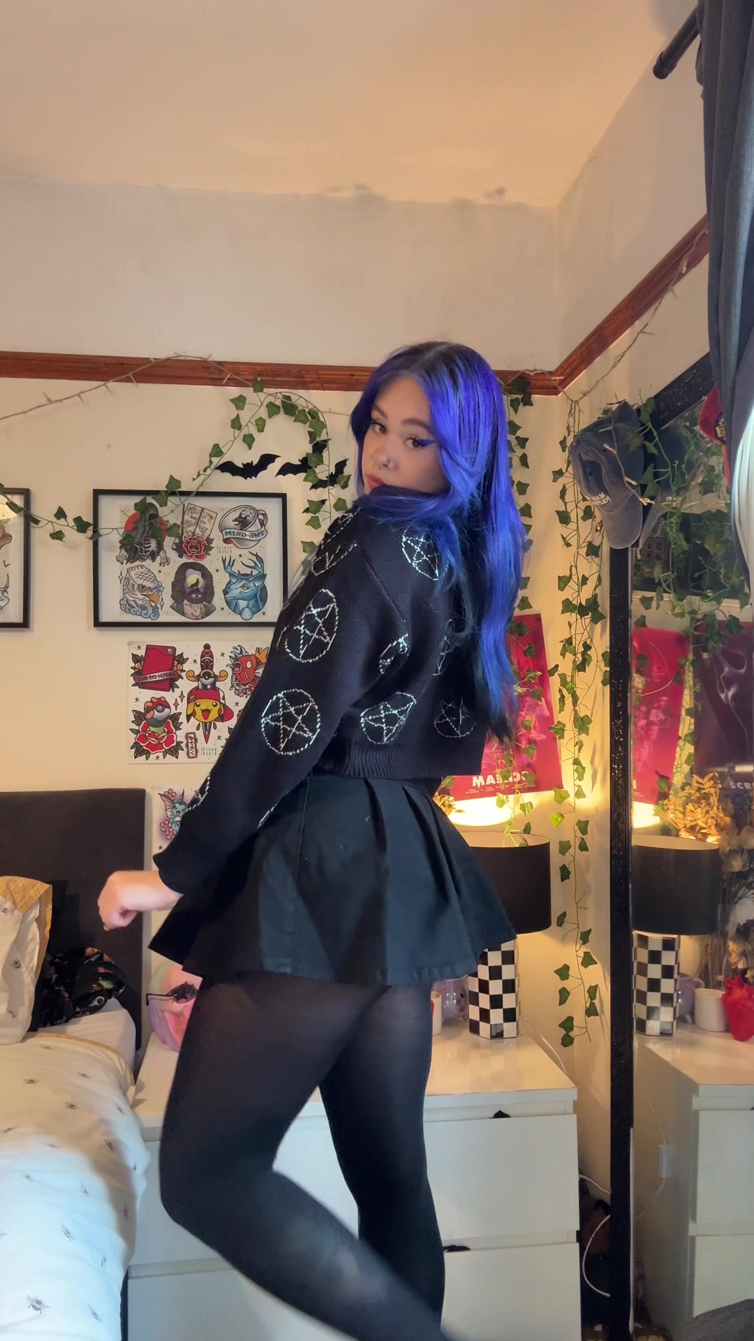 TikTok post by @bridiety for ROMWE. Caption reads: @ROMWE coming through with the alt girl essentials....